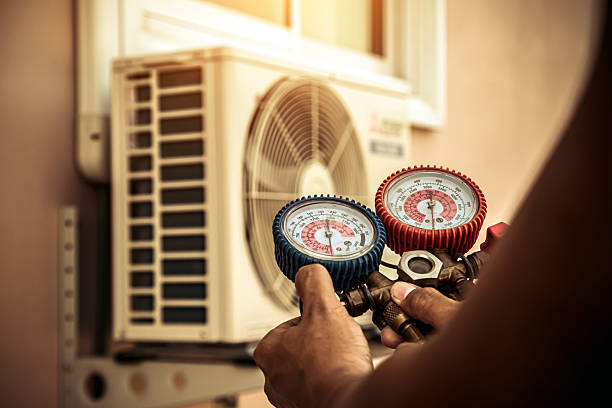Professional Heat Pump Repair technician working in Spencerville, OH